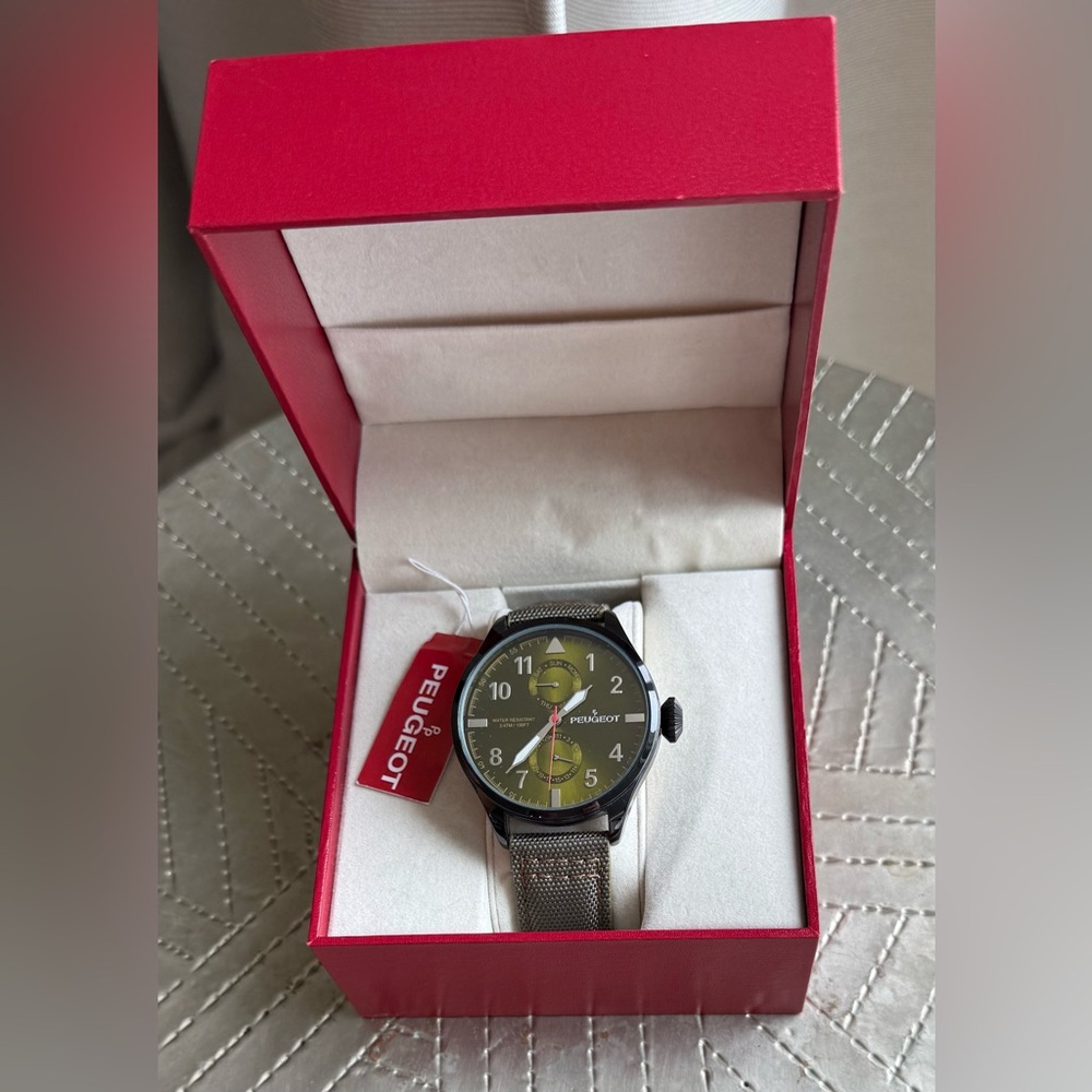 Peugeot Watch with Black and Gold Face